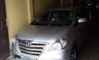 Toyota Innova   E 2014 - Cần bán lại xe Toyota Innova E đời 2014, màu bạc số sàn, 540tr