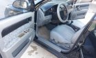 Daewoo Lacetti 2004 - Cần bán xe cũ Daewoo Lacetti sản xuất 2004, màu đen như mới