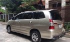 Toyota Innova 2.0E 2015 - Bán Toyota Innova 2.0E năm sản xuất 2015, màu vàng, chính chủ