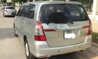 Toyota Innova  2.0E 2014 - Bán gấp Toyota Innova 2.0E đời 2014, màu bạc, số sàn, giá 570tr