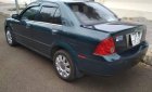 Ford Laser   Ghia 1.8 AT 2005 - Cần bán lại xe Ford Laser Ghia 1.8 AT 2005 số tự động giá cạnh tranh