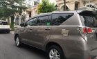 Toyota Innova E 2018 - Cần bán gấp xe Toyota Innova E đời T3/2018, màu nâu, 765 triệu, odo 10,800km