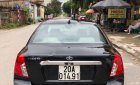 Daewoo Lacetti EX 1.6MT  2011 - Bán xe Daewoo Lacetti năm 2011, màu đen xe gia đình