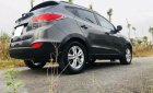 Hyundai Tucson 2010 - Gia đình cần bán xe Tucson 2010 đăng ký 2012, số tự động máy dầu, màu xám