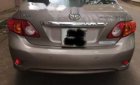 Toyota Corolla altis   2009 - Cần bán xe Toyota Corolla altis sản xuất năm 2009, màu vàng ít sử dụng