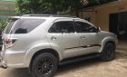 Toyota Fortuner 2.5G 2015 - Bán Toyota Fortuner 2.5G sản xuất 2015, màu bạc số sàn