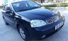 Daewoo Lacetti   2004 - Bán xe Daewoo Lacetti đời 2004, màu đen chính chủ, giá tốt