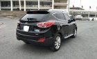 Hyundai Tucson 2.0 AT.  2011 - Cần bán lại xe Hyundai Tucson 2.0 AT. Sản xuất năm 2011, màu đen, xe nhập