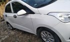 Hyundai Grand i10 2016 - Cần bán Hyundai Grand i10 năm 2016, màu trắng, nhập khẩu nguyên chiếc xe gia đình 