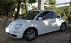 Volkswagen Beetle   1.6AT 2009 - Cần bán gấp Volkswagen Beetle 1.6AT năm 2009, màu trắng, nhập khẩu nguyên chiếc, 520tr