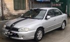 Kia Spectra 1.6 MT 2004 - Cần bán Kia Spectra 1.6 MT sản xuất 2004, màu bạc như mới