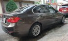 BMW 3 Series 320i 2014 - Cần bán xe BMW 3 Series 320i sản xuất năm 2014, màu xám, giá 900tr