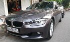 BMW 3 Series 320i 2014 - Cần bán xe BMW 3 Series 320i sản xuất năm 2014, màu xám, giá 900tr