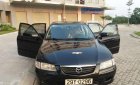 Mazda 626 2000 - Cần bán lại xe Mazda 626 năm sản xuất 2000, màu đen, nhập khẩu nguyên chiếc