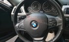 BMW 3 Series 320i 2014 - Cần bán xe BMW 3 Series 320i sản xuất năm 2014, màu xám, giá 900tr