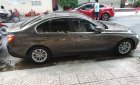 BMW 3 Series 320i 2014 - Cần bán xe BMW 3 Series 320i sản xuất năm 2014, màu xám, giá 900tr