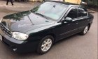 Kia Spectra LS 2004 - Cần bán gấp Kia Spectra LS 2004, màu đen, xe nhập, số sàn