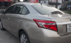 Toyota Vios   2014 - Cần bán gấp Toyota Vios đời 2014 màu vàng, giá tốt