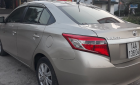 Toyota Vios   2014 - Cần bán gấp Toyota Vios đời 2014 màu vàng, giá tốt