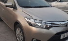 Toyota Vios   2014 - Cần bán gấp Toyota Vios đời 2014 màu vàng, giá tốt