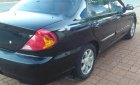 Kia Spectra 1.6 2004 - Bán ô tô Kia Spectra 1.6 sản xuất năm 2004, màu đen