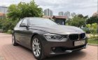 BMW 3 Series  320i  2014 - Bán BMW 3 Series 320i sản xuất 2014, màu nâu, xe nhập