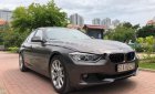 BMW 3 Series 320i 2013 - Cần bán BMW 3 Series 320i đời 2013, màu nâu, xe nhập  