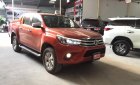Toyota Hilux 2.8G AT 2016 - (Hãng) Bán Toyota Hilux 2.8 G 4x4 AT đời 2016, màu cam, nhập khẩu, giá tốt