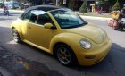 Volkswagen New Beetle    2003 - Xe Volkswagen New Beetle mui trần, đăng ký lần đầu 2003, màu vàng xe nhập