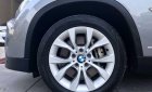 BMW X1 2010 - Bán xe BMW X1 sản xuất 2010 màu xám (ghi), giá 587 triệu, xe nhập