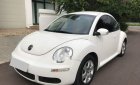 Volkswagen New Beetle 1.6 AT 2009 - Cần bán lại xe Volkswagen New Beetle 1.6 AT đời 2009, màu trắng, nhập khẩu nguyên chiếc