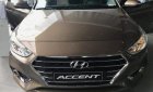 Hyundai Accent  1.4AT 2018 - Bán Hyundai Accent năm 2018, màu vàng, giá tốt