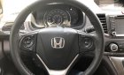 Honda CR V 2.4AT 2013 - Bán Honda CRV 2.4AT 5 chỗ màu xám bạc, mua mới tại hãng tháng 6 năm 2013, số TP HCM, chạy 75.000km