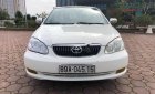 Toyota Corolla J 1.3 MT 2002 - Cần bán lại xe Toyota Corolla J 1.3 MT đời 2002, màu trắng xe gia đình