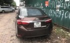 Toyota Corolla altis 1.8G 2015 - Bán Toyota Corolla altis G đời 2015, màu nâu, xe gia đình