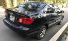 Toyota Corolla J 1.3 MT 2003 - Bán Toyota Corolla J 1.3 MT đời 2003, màu đen như mới