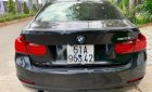 BMW 3 Series 320i 2014 - Bán BMW 3 Series 320i sản xuất năm 2014, màu đen, nhập khẩu, giá tốt