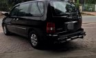 Kia Carnival GS 2006 - Cần bán xe Kia Carnival năm 2006 màu đen, giá chỉ 220 triệu, nhập khẩu