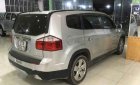 Chevrolet Orlando 2013 - Bán Chevrolet Orlando sản xuất năm 2013, màu bạc xe gia đình, 395tr