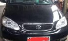 Toyota Corolla 2003 - Bán Toyota Corolla năm sản xuất 2003, màu đen chính chủ giá cạnh tranh