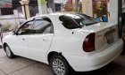 Daewoo Lanos SX 2005 - Cần bán Daewoo Lanos SX sản xuất 2005, màu trắng xe gia đình giá cạnh tranh