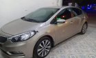 Kia K3 2015 - Cần bán Kia K3 năm sản xuất 2015, màu vàng, giá 450tr