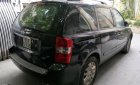 Kia Carnival EX 2.7 MT 2009 - Bán Kia Carnival 2.7 đời 2009, màu đen, nhập khẩu xe gia đình, 380tr