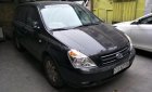 Kia Carnival EX 2.7 MT 2009 - Bán Kia Carnival 2.7 đời 2009, màu đen, nhập khẩu xe gia đình, 380tr