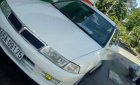 Mitsubishi Lancer  MT 2000 - Cần bán lại xe Mitsubishi Lancer MT năm sản xuất 2000, màu trắng, máy phun xăng không hao xăng