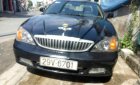 Daewoo Magnus    2004 - Cần bán xe Daewoo Magnus năm sản xuất 2004, màu đen, máy êm