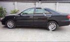 Toyota Camry 2003 - Bán Toyota Camry đời 2003, màu đen, còn rất đẹp, đi xa tốt