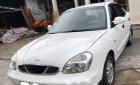 Daewoo Nubira   2004 - Bán xe Daewoo Nubira năm sản xuất 2004, màu trắng, máy zin êm ru