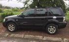 Ford Escape  AT 2004 - Cần bán Ford Escape AT 2004, màu đen, form mới, đèn ống, xe còn rất mới