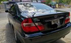 Toyota Camry 2004 - Cần bán Toyota Camry 2004, màu đen  